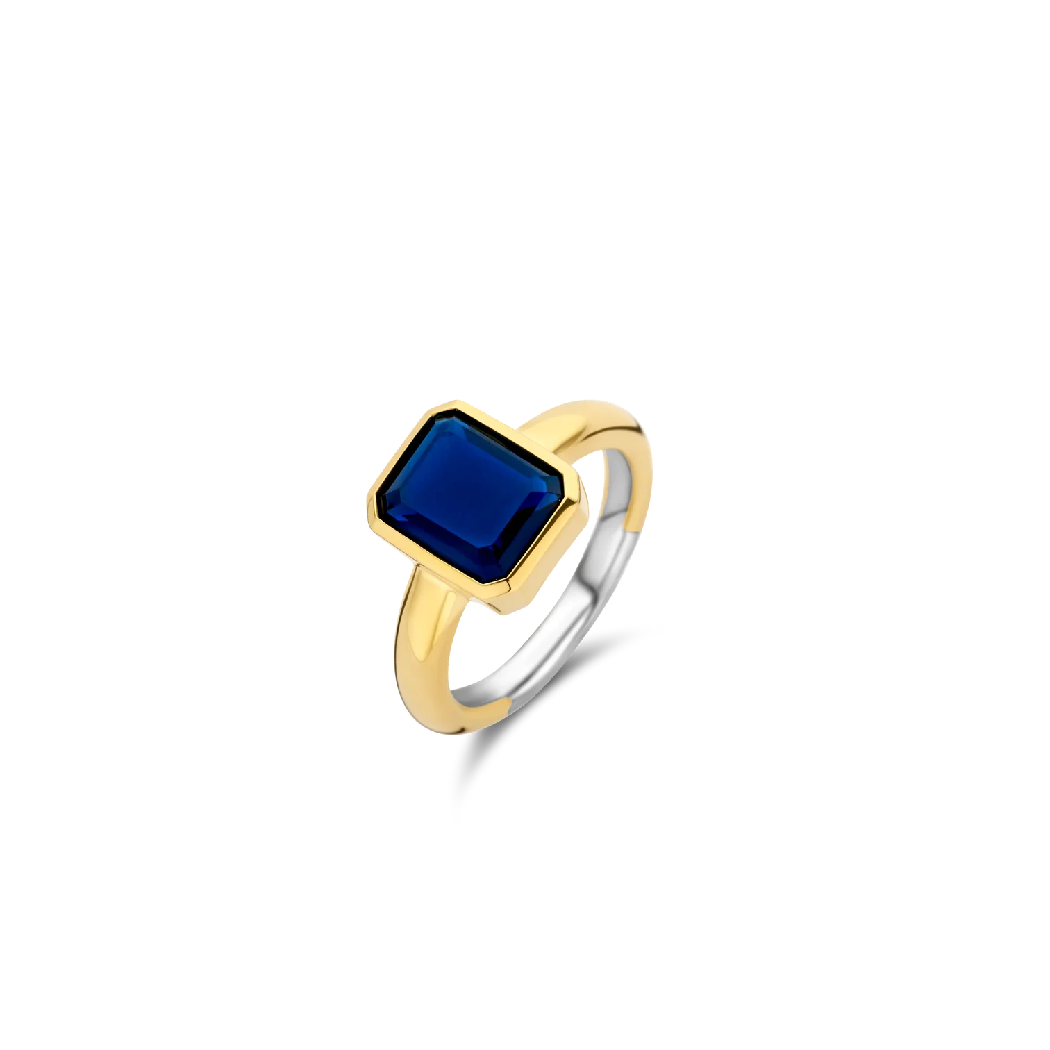 Anillo de plata bañada en oro amarillo con piedra azul