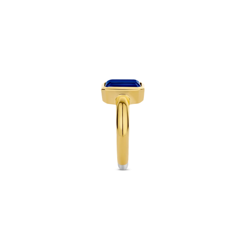 Anillo de plata bañada en oro amarillo con piedra azul