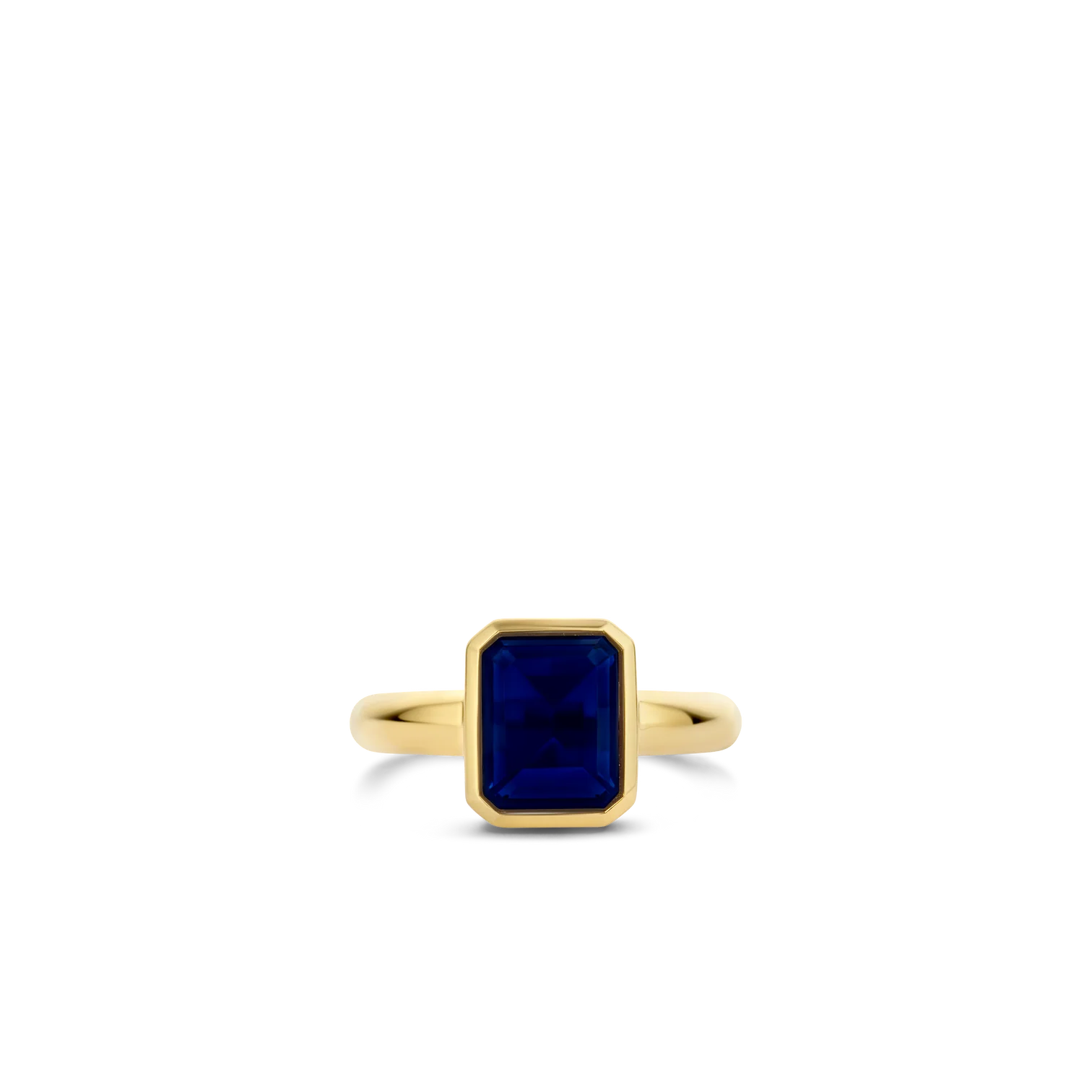 Anillo de plata bañada en oro amarillo con piedra azul