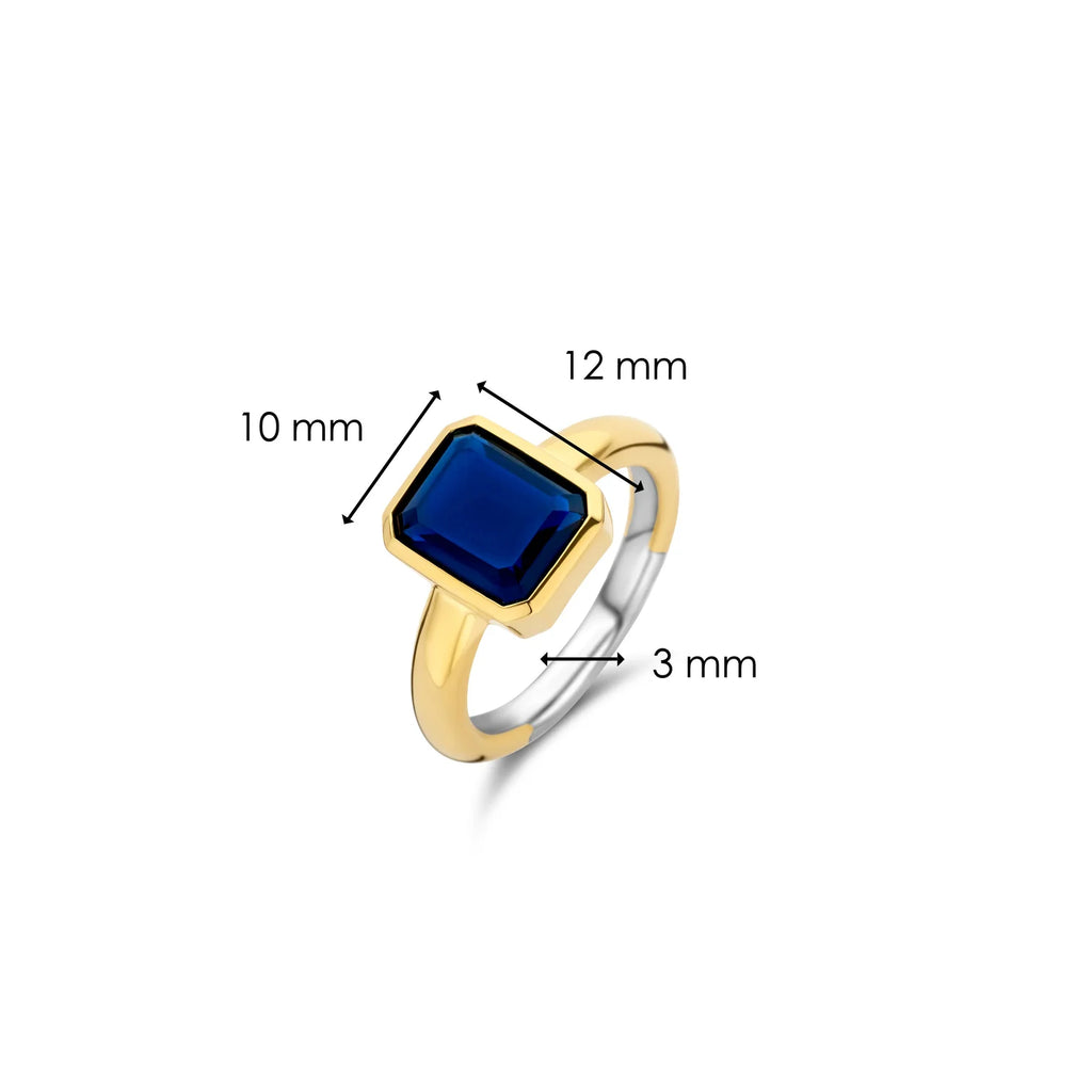 Anillo de plata bañada en oro amarillo con piedra azul