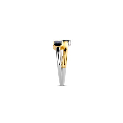 Anillo de plata bañada en oro amarillo con piedra azul