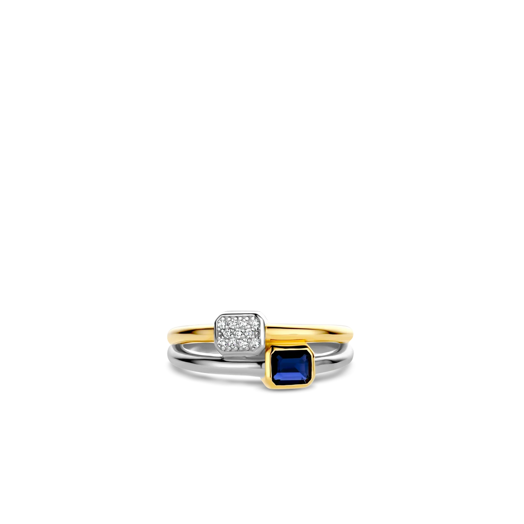 Anillo de plata bañada en oro amarillo con piedra azul