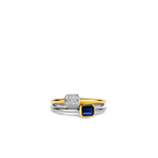 Anillo de plata bañada en oro amarillo con piedra azul