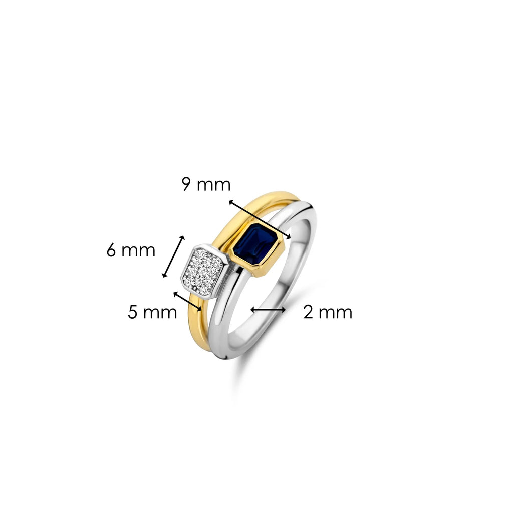 Anillo de plata bañada en oro amarillo con piedra azul