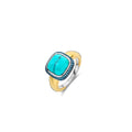 Anillo de plata dorada con piedra turquesa