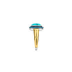 Anillo de plata dorada con piedra turquesa