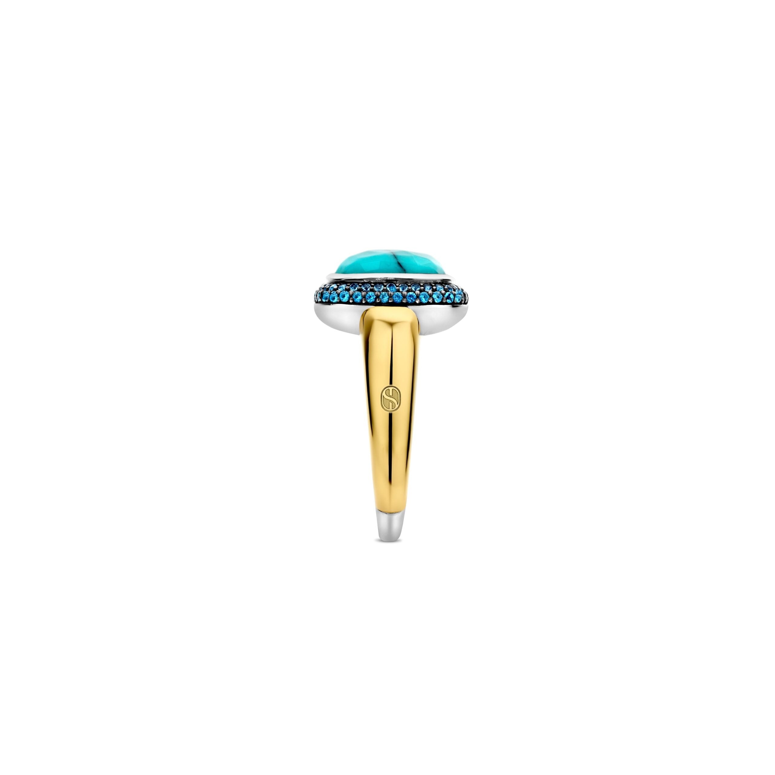 Anillo de plata dorada con piedra turquesa