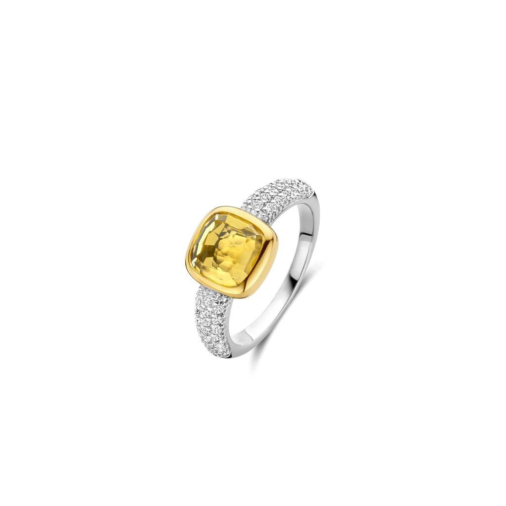 Anillo de plata bañada en oro con piedra amarilla