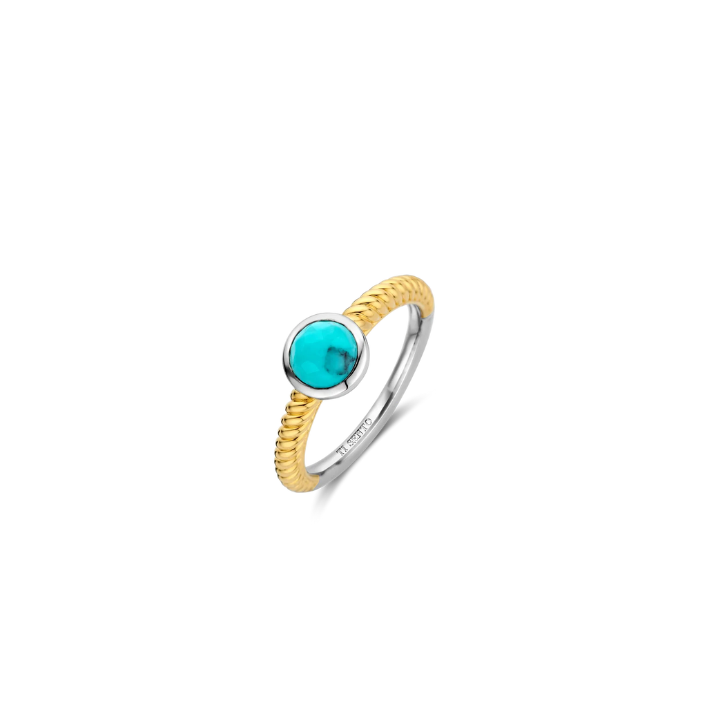 Anillo de plata bañada en oro amarillo con piedra turquesa