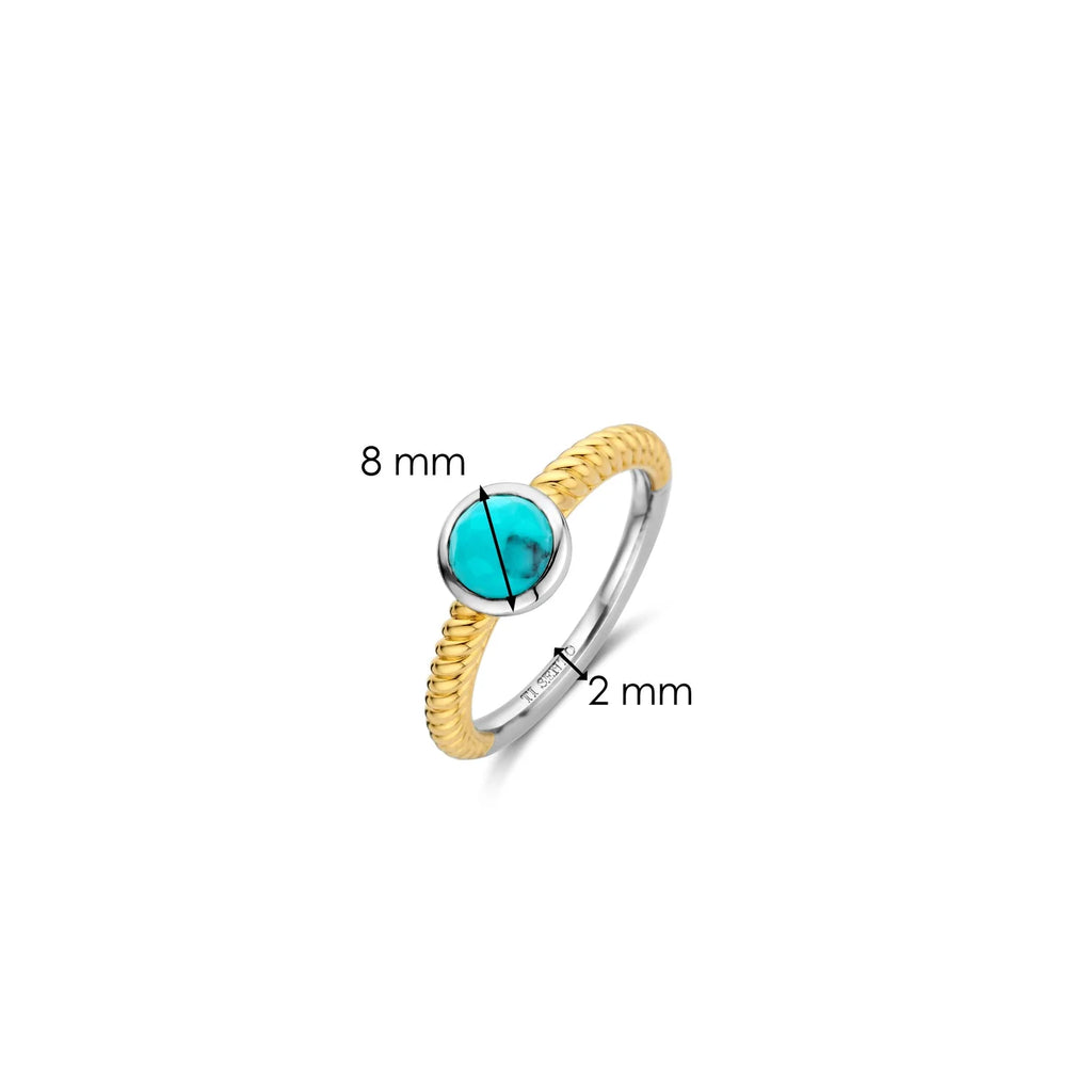 Anillo de plata bañada en oro amarillo con piedra turquesa