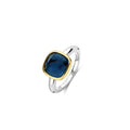 Anillo de plata bañada en oro con piedra azul