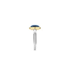 Anillo de plata bañada en oro con piedra azul