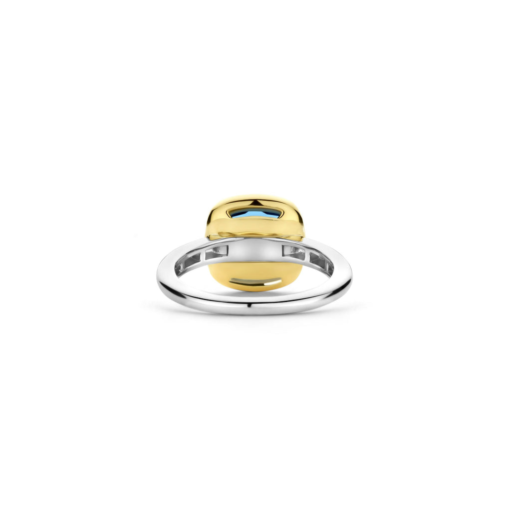 Anillo de plata bañada en oro con piedra azul