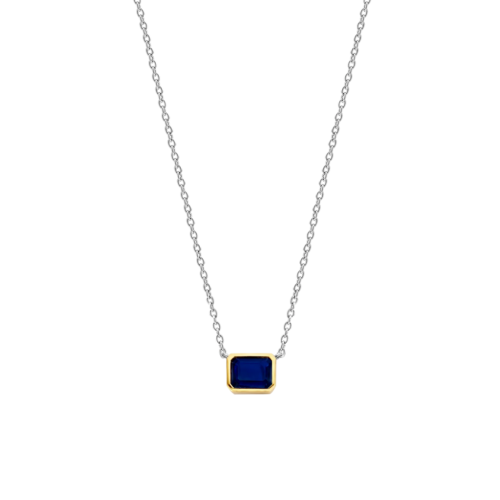 Collar de plata bañada en oro amarillo con piedra azul