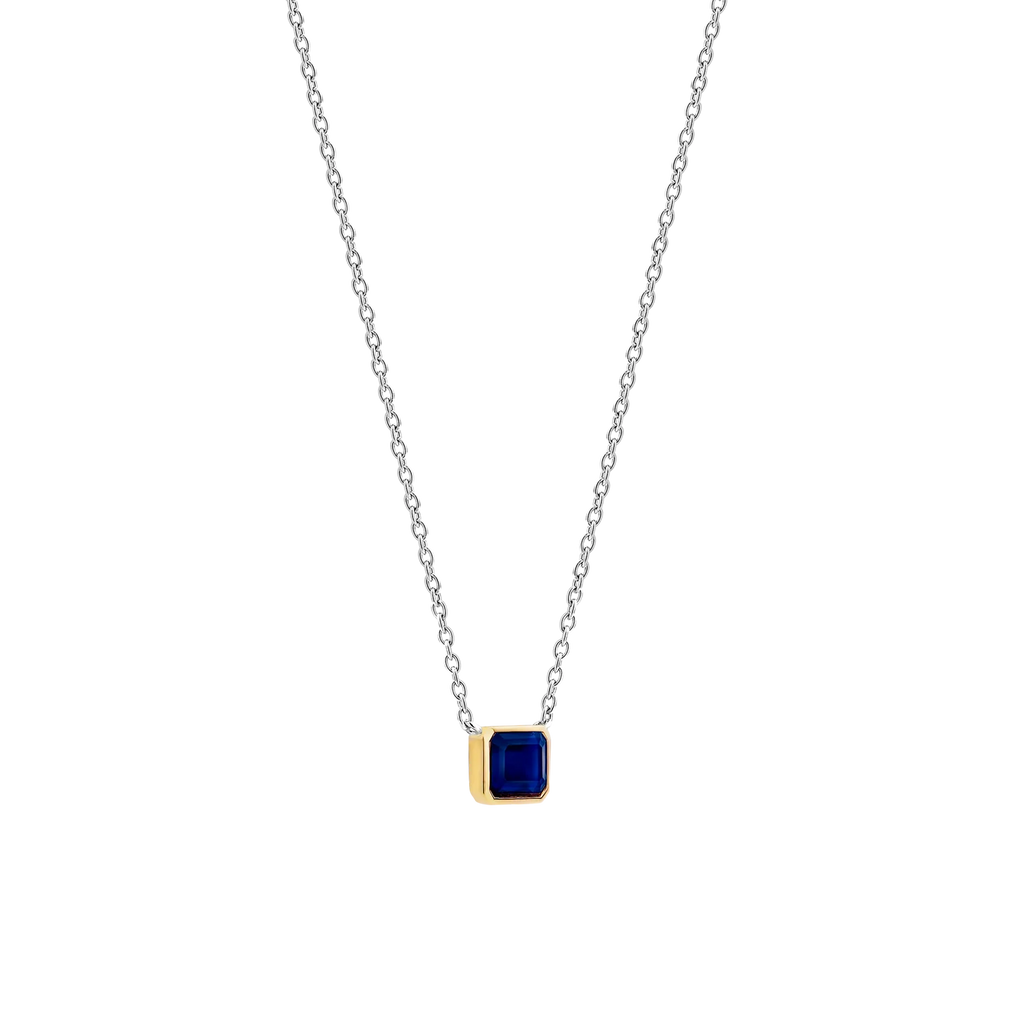 Collar de plata bañada en oro amarillo con piedra azul