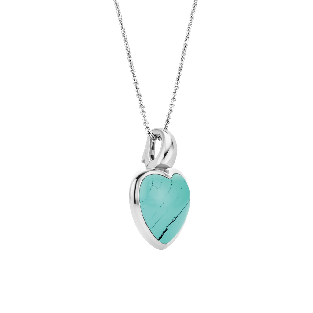Dije corazón de plata con baño de platino y piedra turquesa
