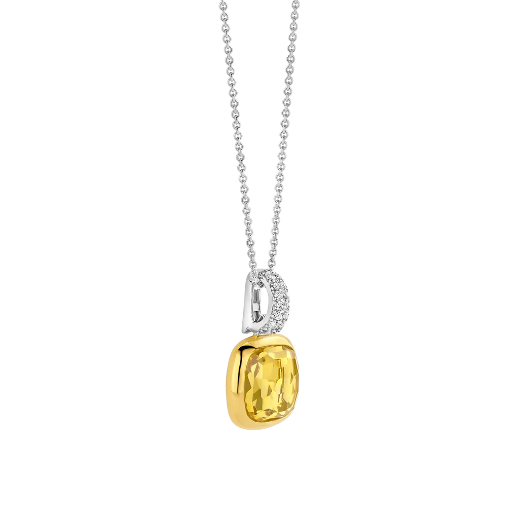Colgante de plata bañada en oro con piedra amarilla