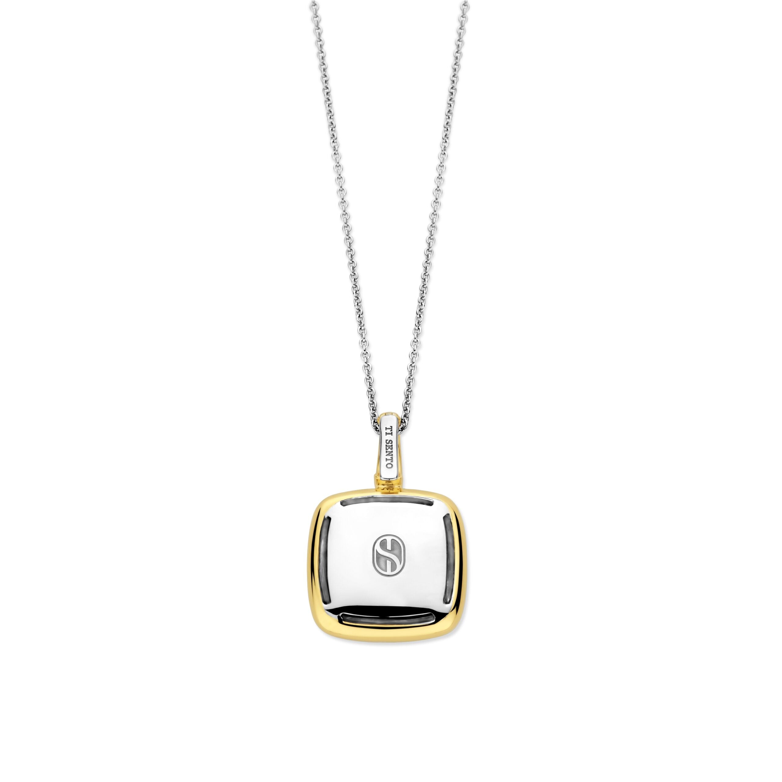 Dije de plata bañada en oro amarillo con piedra caqui