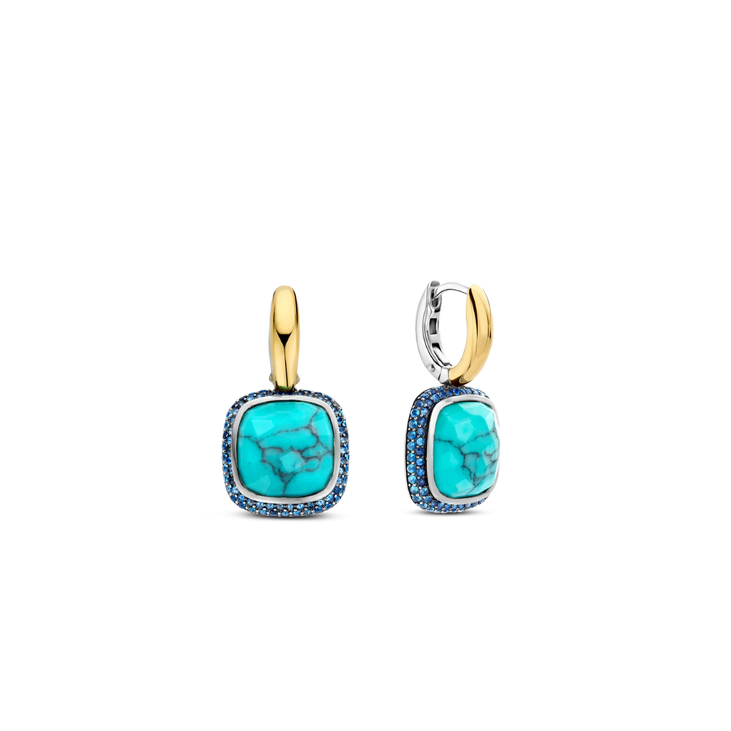 Aretes de plata dorada con piedra turquesa