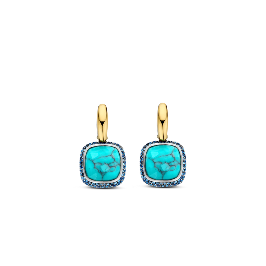 Aretes de plata dorada con piedra turquesa