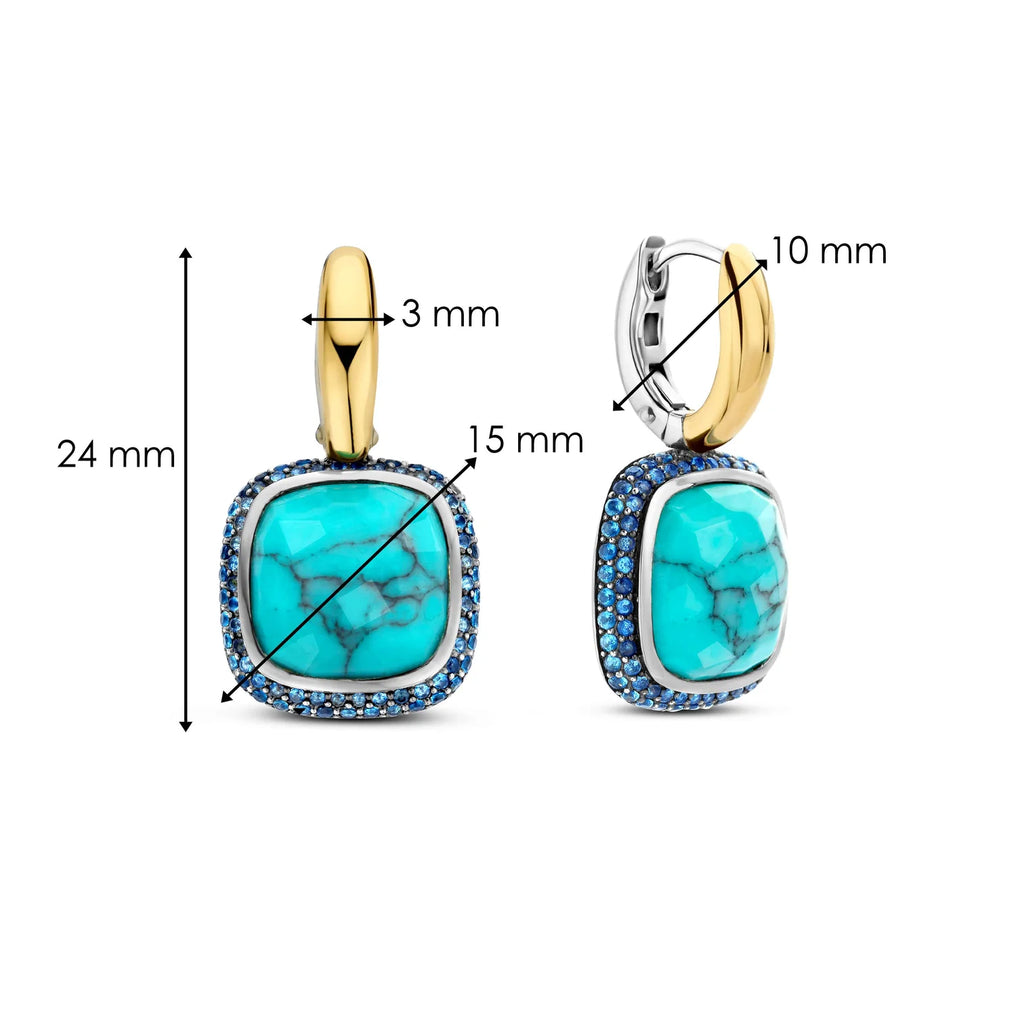 Aretes de plata dorada con piedra turquesa