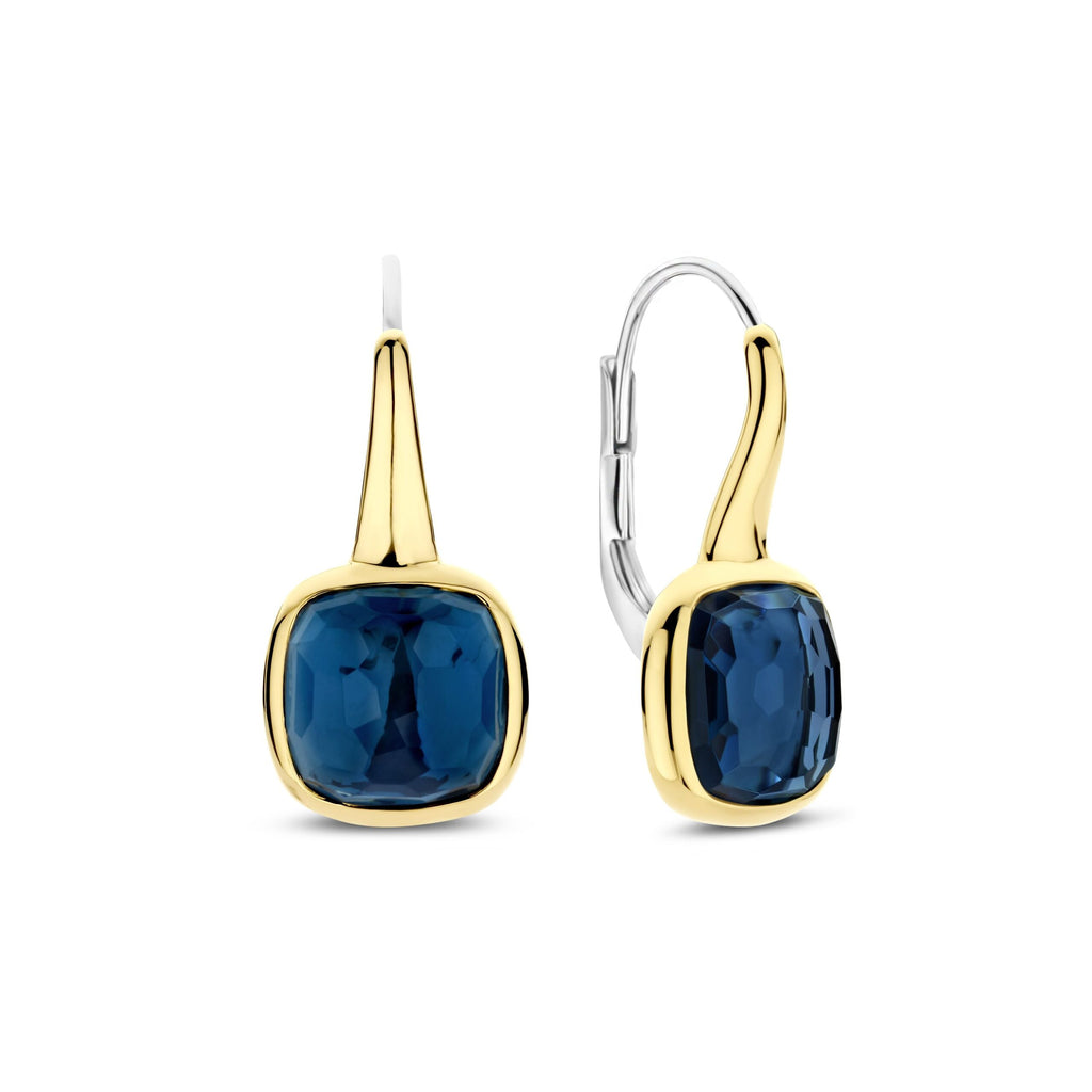 Aretes de plata bañados en oro con piedra azul