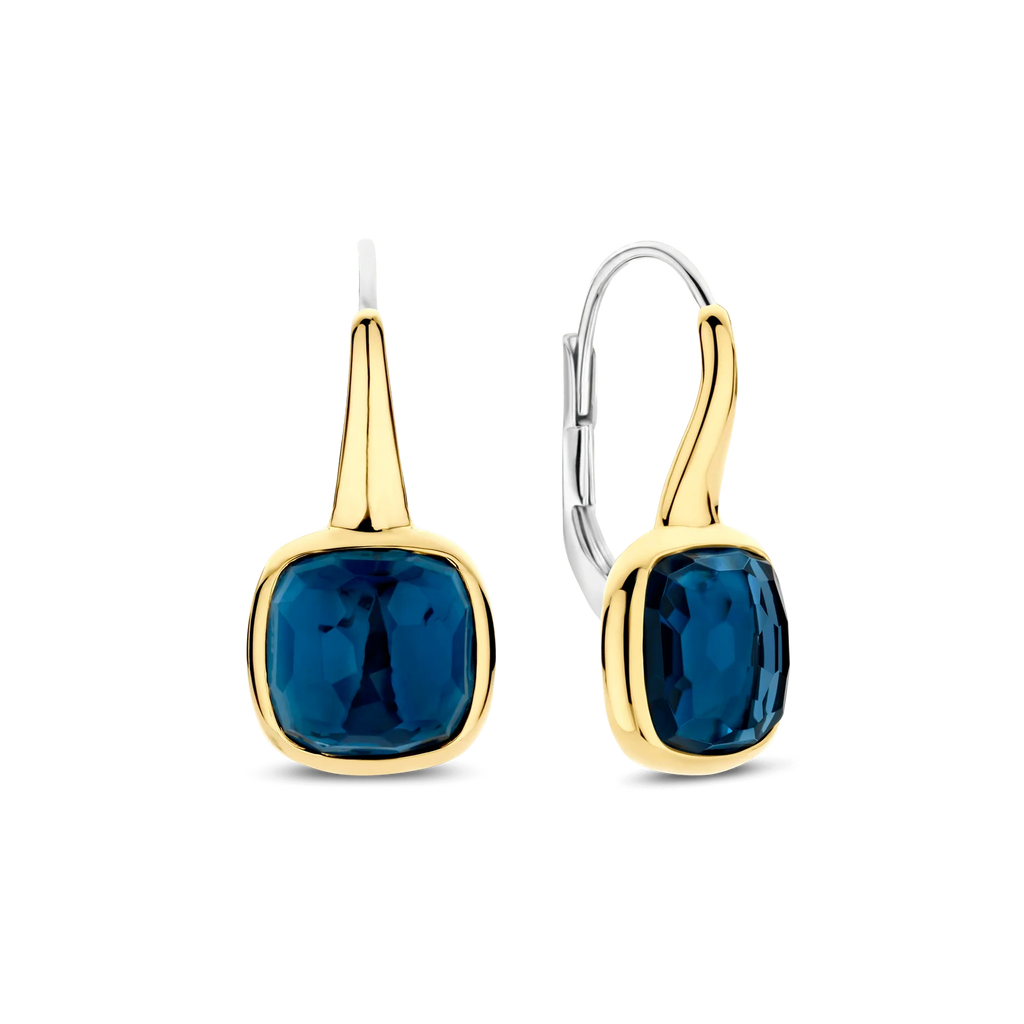 Aretes de plata bañados en oro con piedra azul