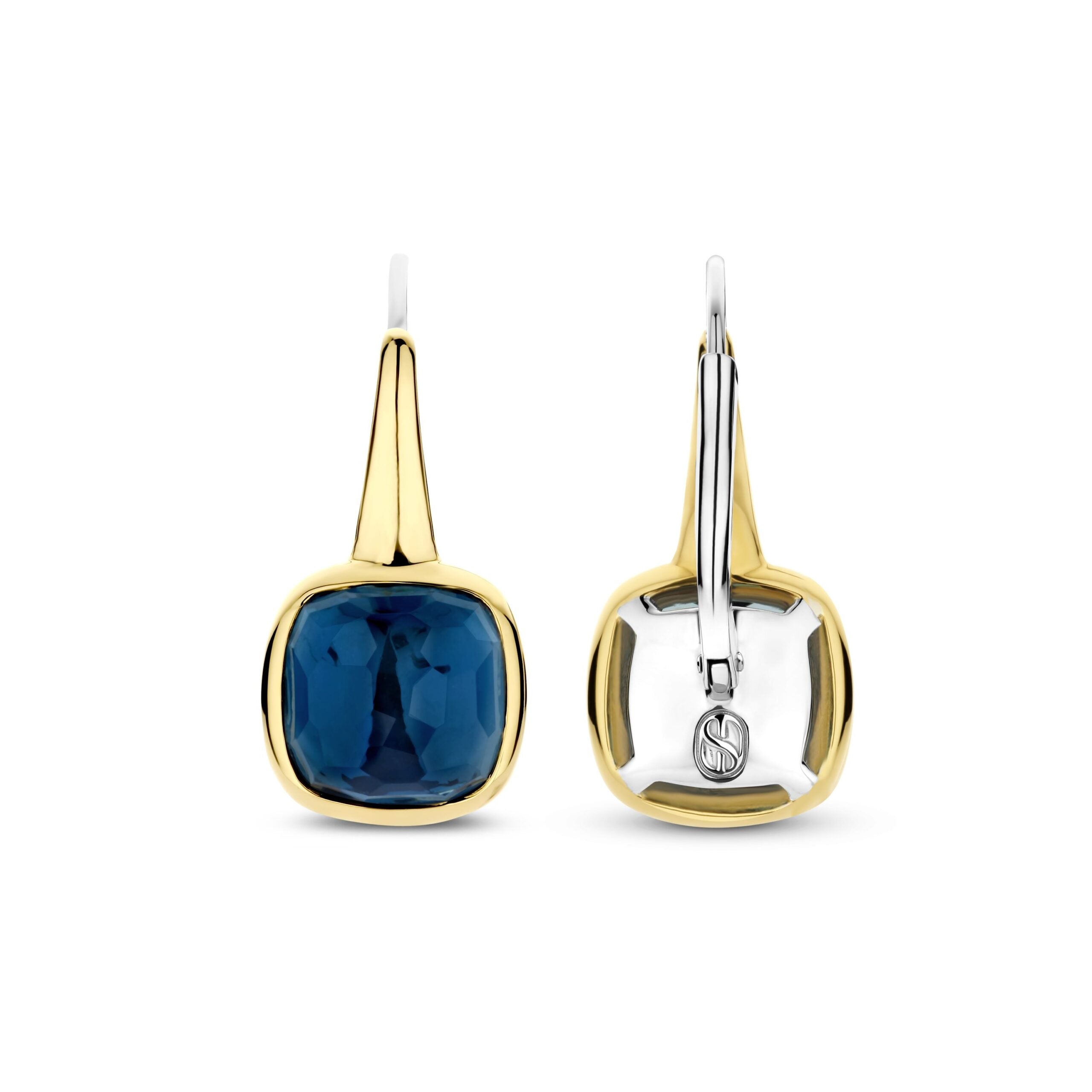 Aretes de plata bañados en oro con piedra azul