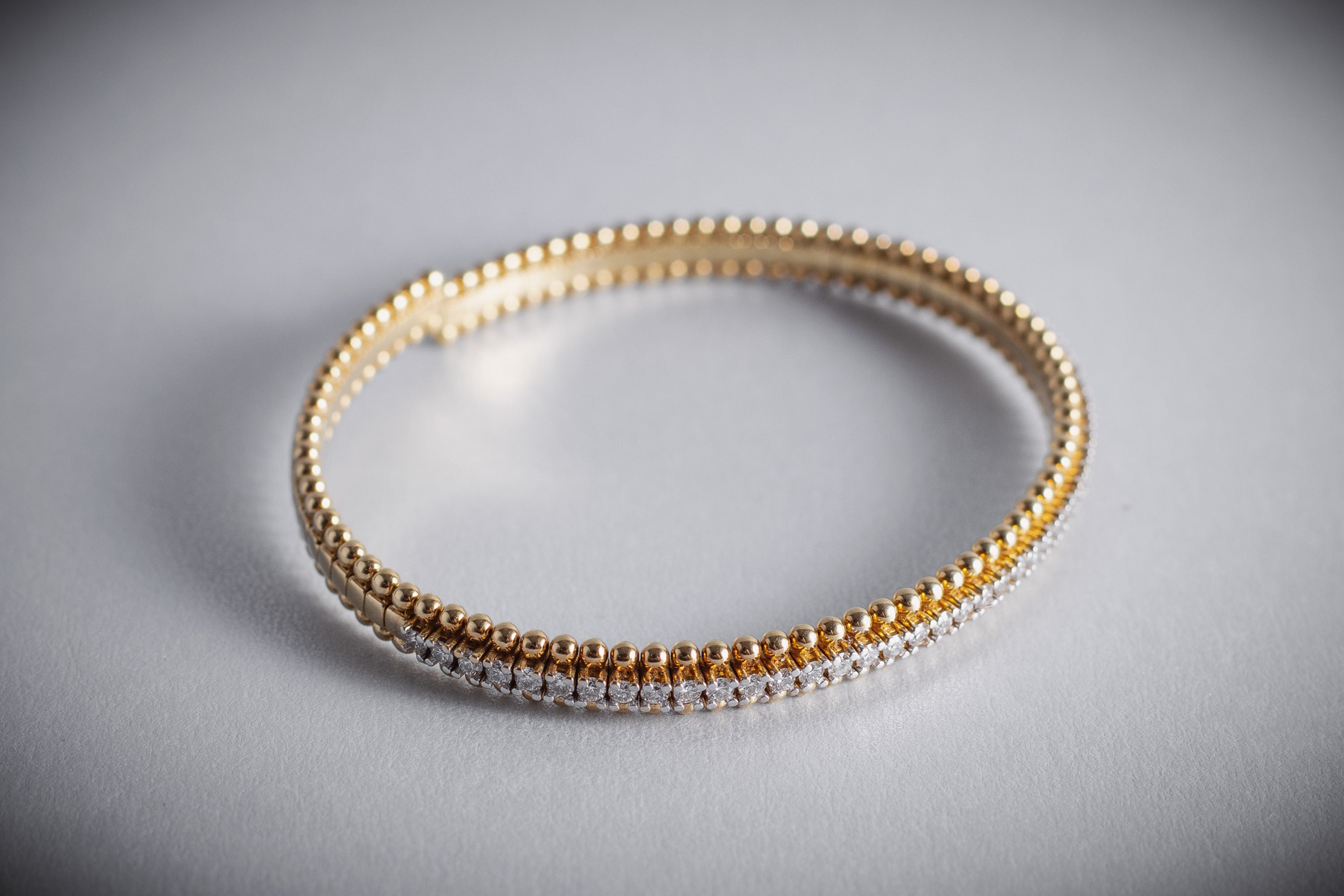 Aro de 18K tennis oro amarillo