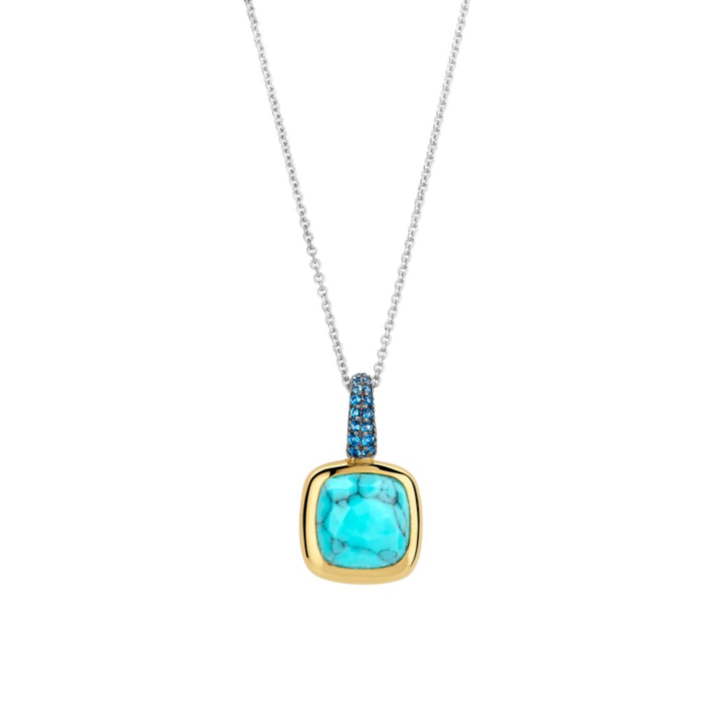 Colgante de plata dorada con piedra turquesa