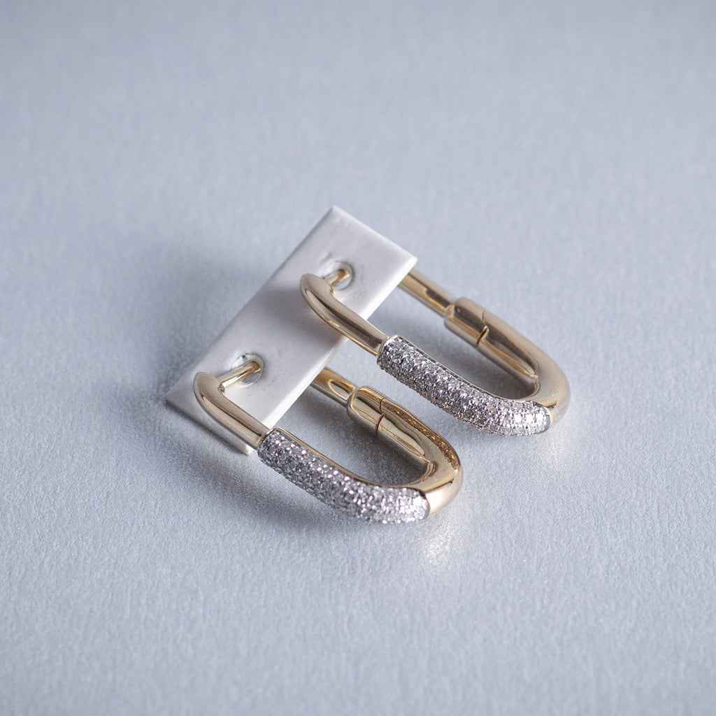 Aretes de 14K oro amarillo Candado